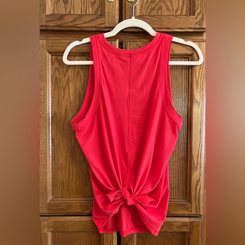 Peach athletic tank - center seam split back.